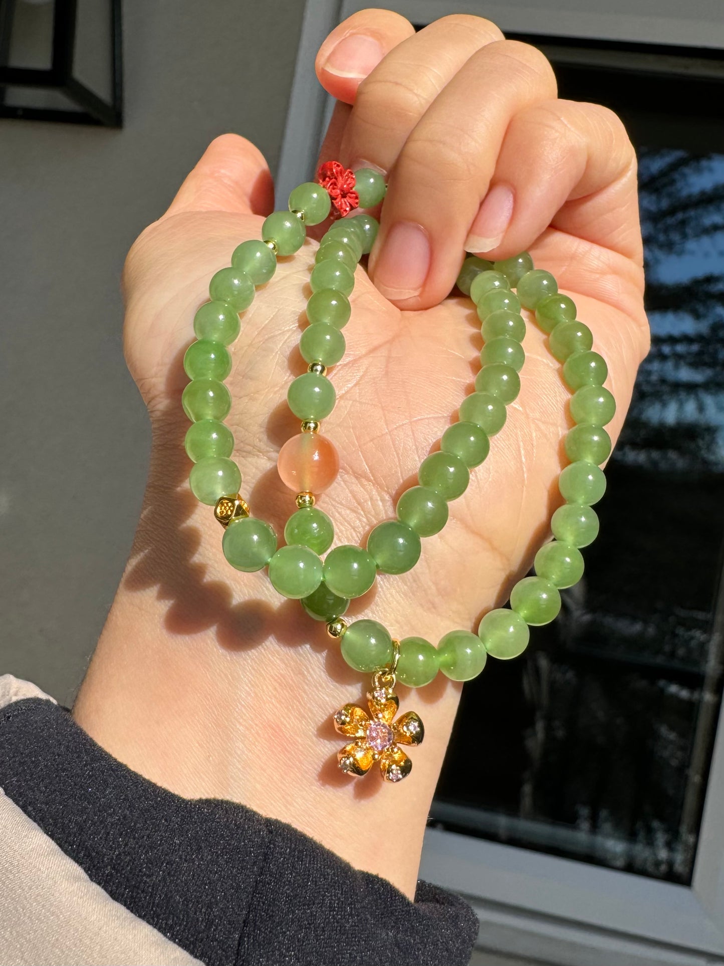 Natural Apple Green Nephrite Beaded Bracelet with a sakura charm