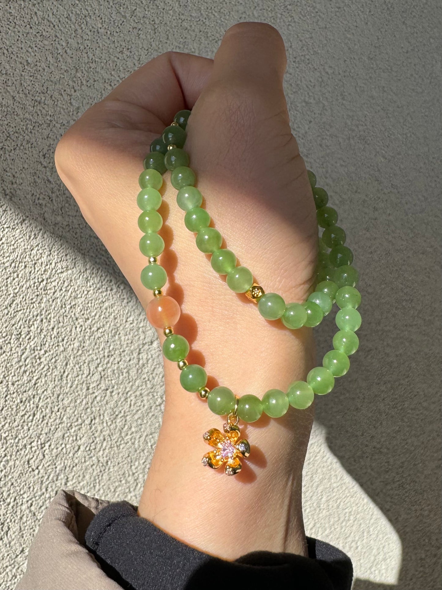 Natural Apple Green Nephrite Beaded Bracelet with a sakura charm