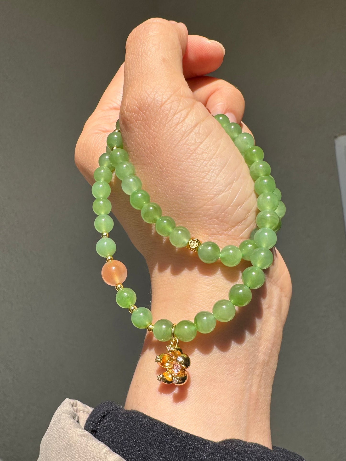 Natural Apple Green Nephrite Beaded Bracelet with a sakura charm