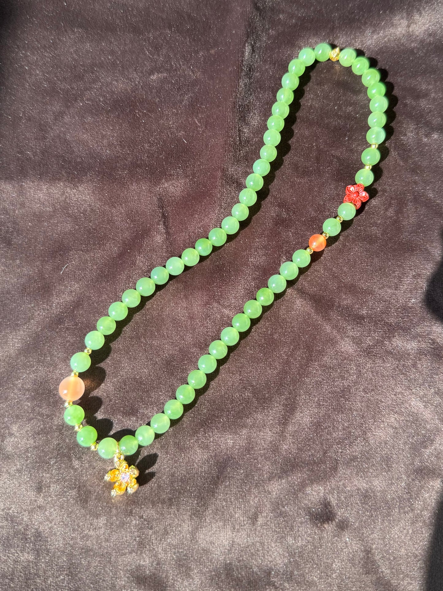 Natural Apple Green Nephrite Beaded Bracelet with a sakura charm